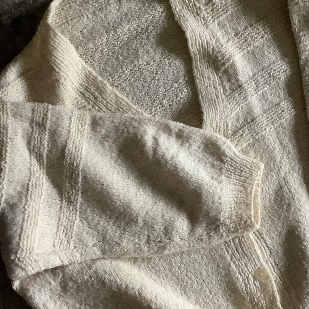 Vintage  wool handmade cardigan. Deep V neckline. 5 button closure. Light Cream